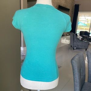 Blue form fitting T-shirt